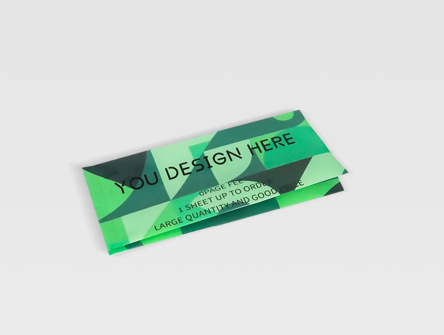 Angled top down view of a green side gusset pouch showing the gusset folds and glossy surface