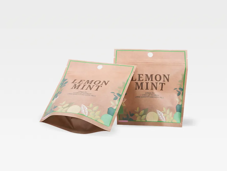 Two tea packaging bags, one flat and one standing, highlighting structure and visual contrast