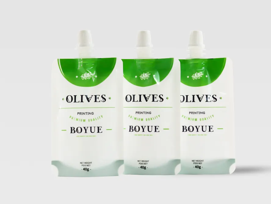 Three green and white liquid spout pouches displayed in a row for product comparison