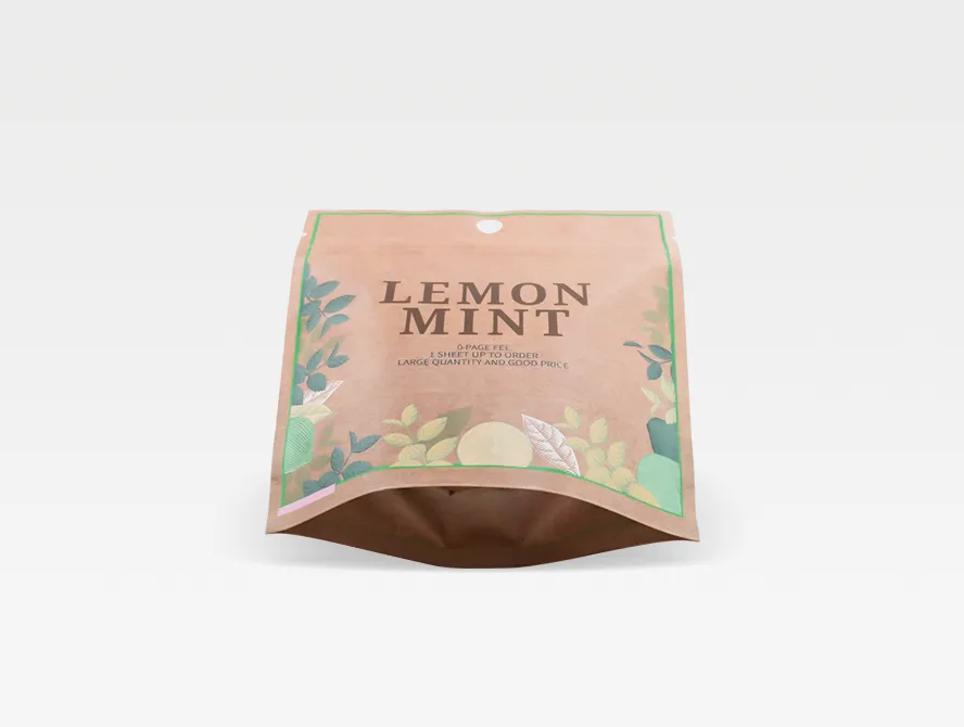 Angled view of a resealable stand up tea pouch in kraft material with floral design