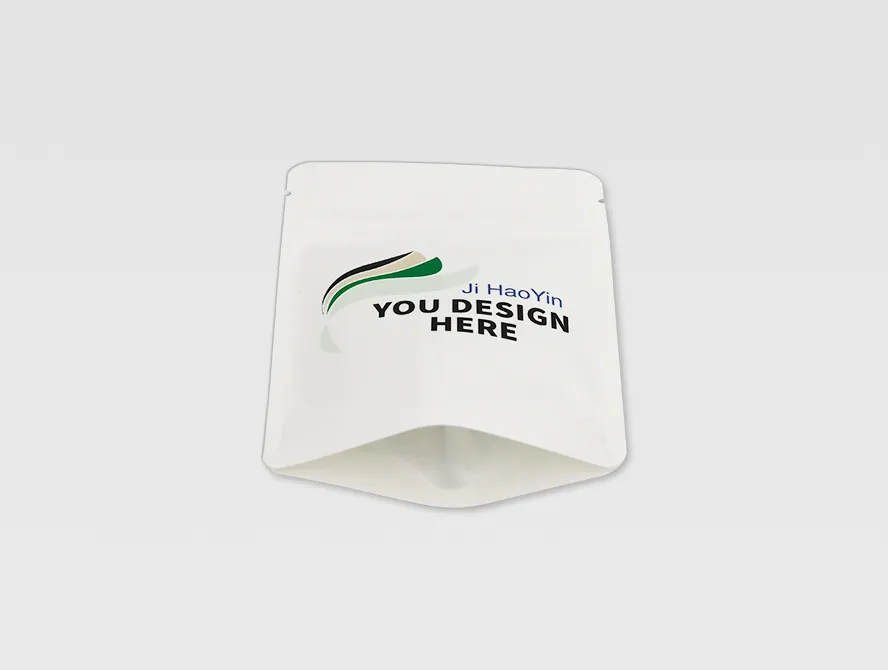 Bottom gusset view of a white ziplock kraft bag, showing stable base and printed design