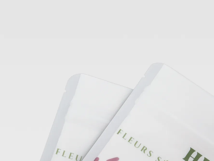 Clear window stand up pouches in white with floral design