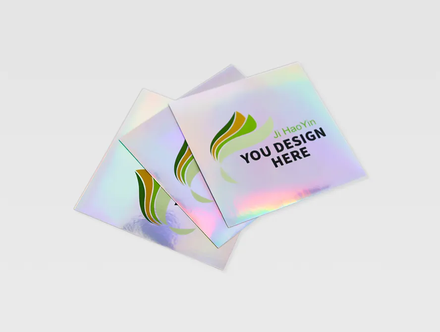 Stack of custom holographic stickers with rainbow shine