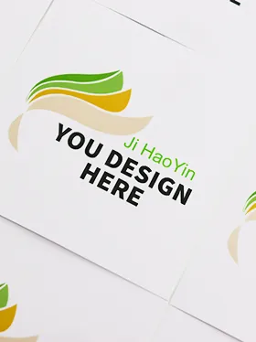Close up of white vinyl stickers with green and yellow icon (2)
