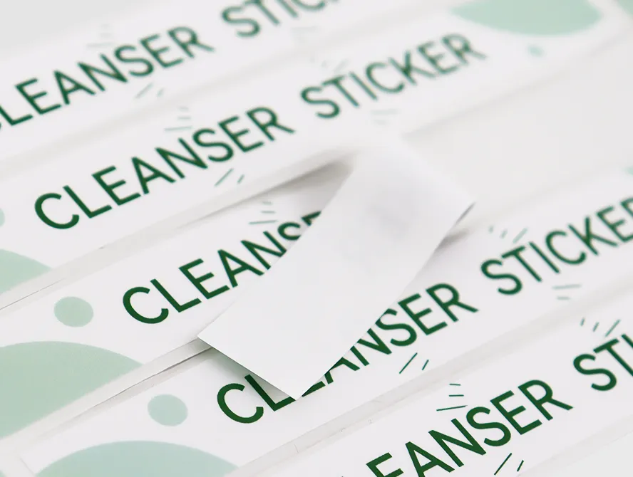 Close up of cleaning cream labels in roll form