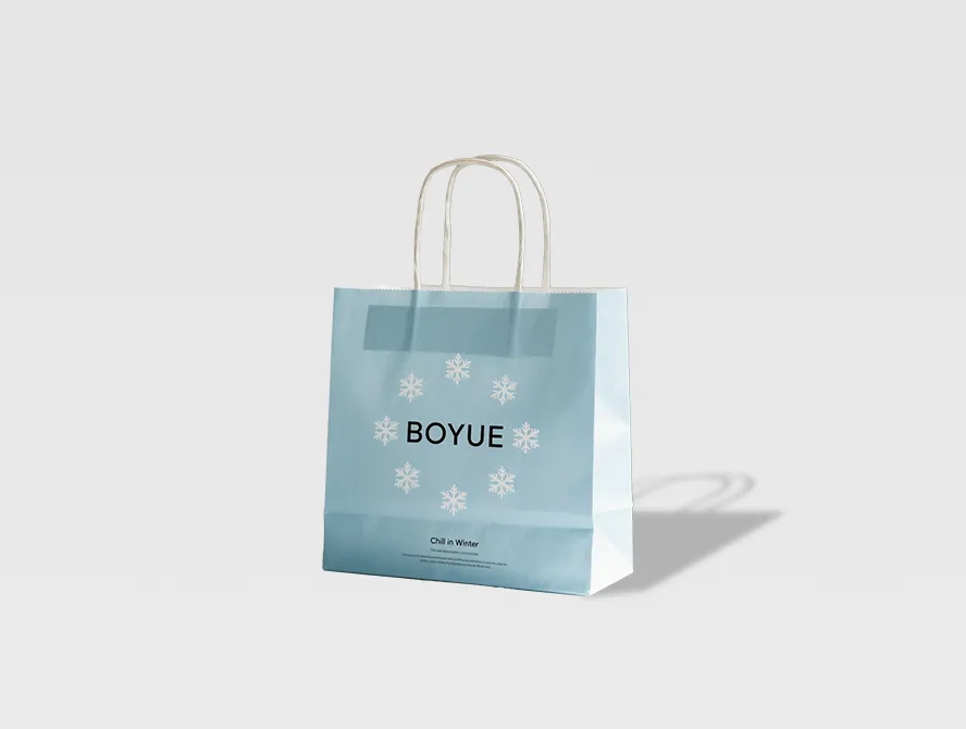 Light blue custom gift bag with white text