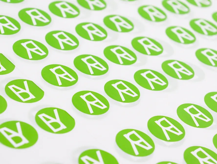 Close up of custom sticker sheets with green pattern