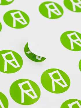 Custom stickers on sheet with bold green design (2)