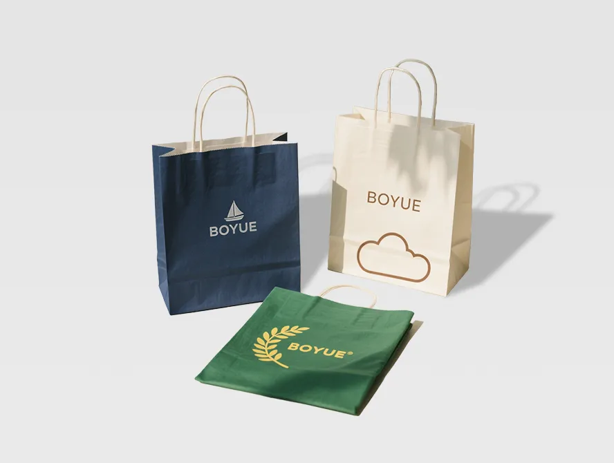 Custom kraft paper gift bags with gold logo