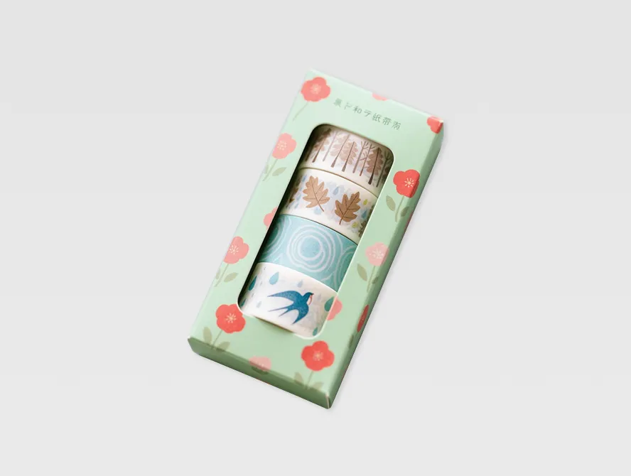 Green washi tape set with floral themed packaging design