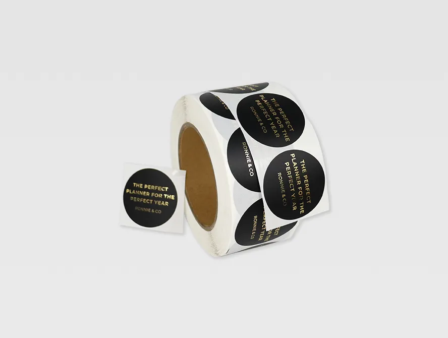 Round gold foil stickers shown in group display