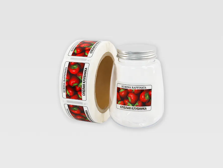 Front view of beverage label roll with vibrant printed graphics