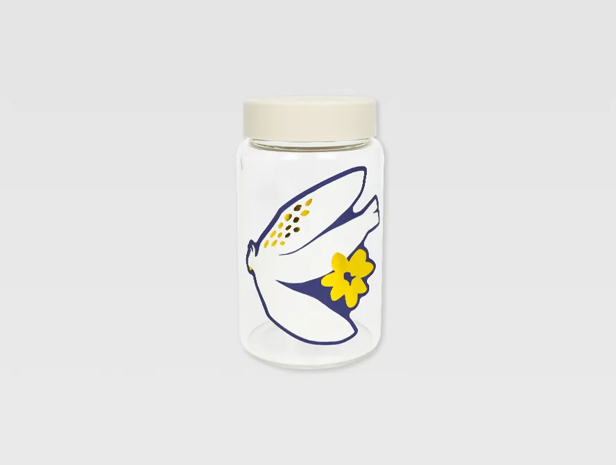 Small jar decorated with a custom gold foil flower sticker