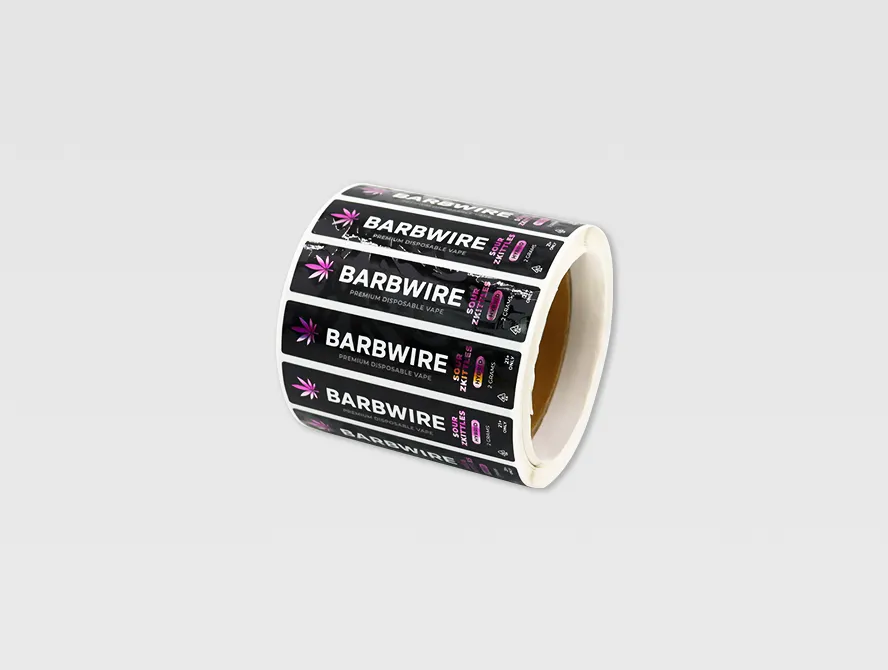 Roll of custom uv spot labels with glossy black and purple print