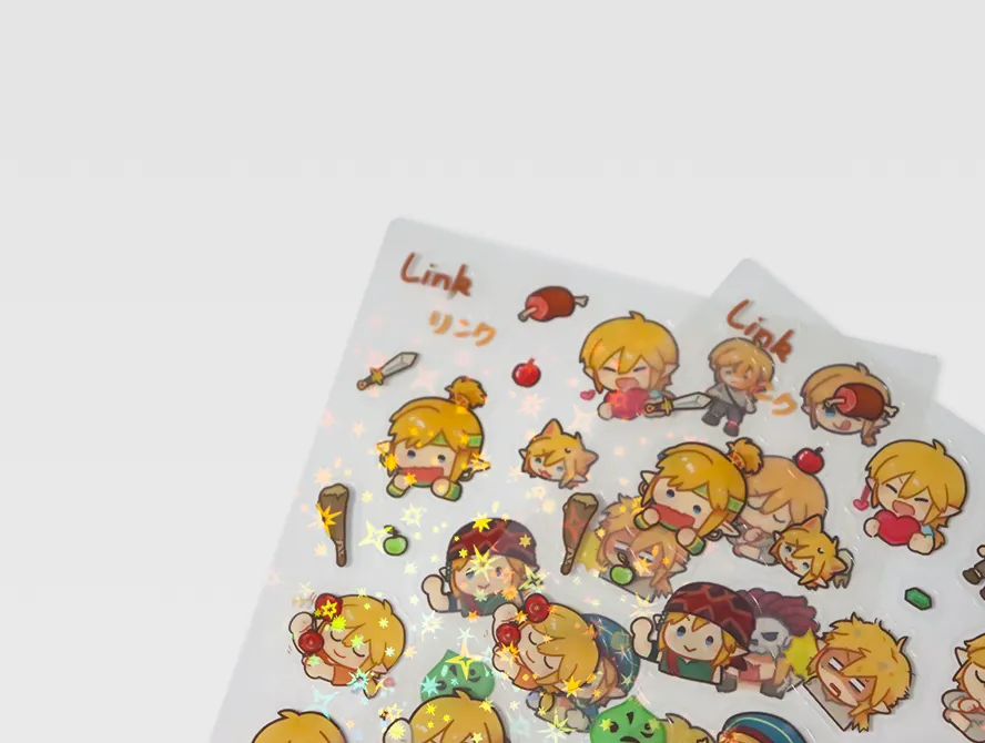 Close up of clear kiss cut stickers with vibrant food themed designs