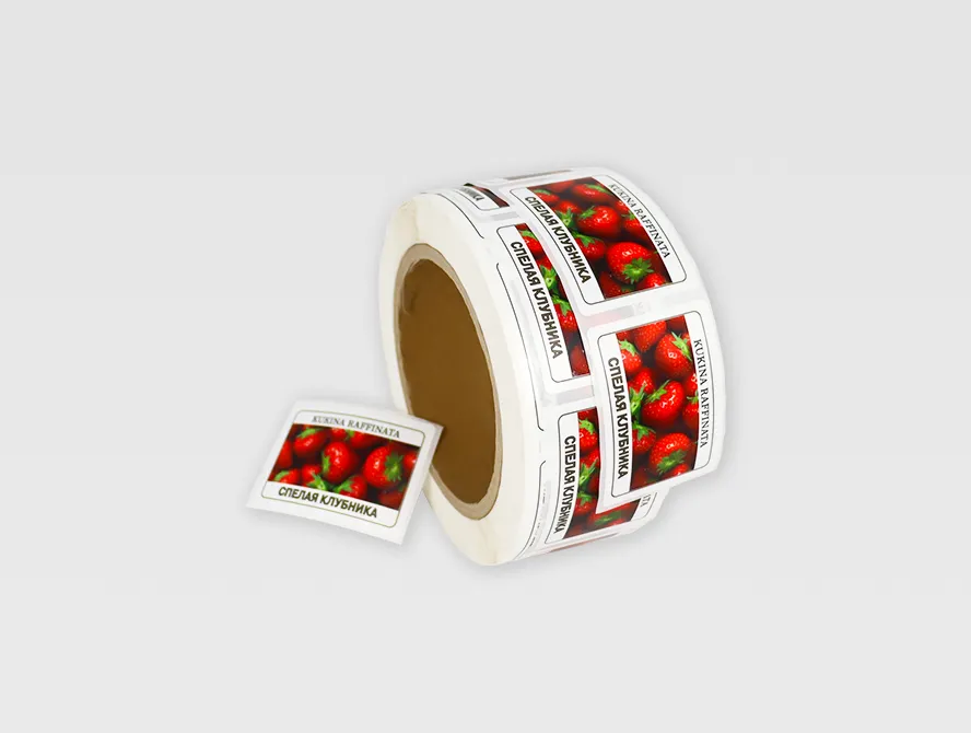 Side view of beverage label roll showing label alignment and finish