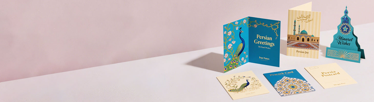Custom printed paper cards and postcards with persian designs and greeting themes on display