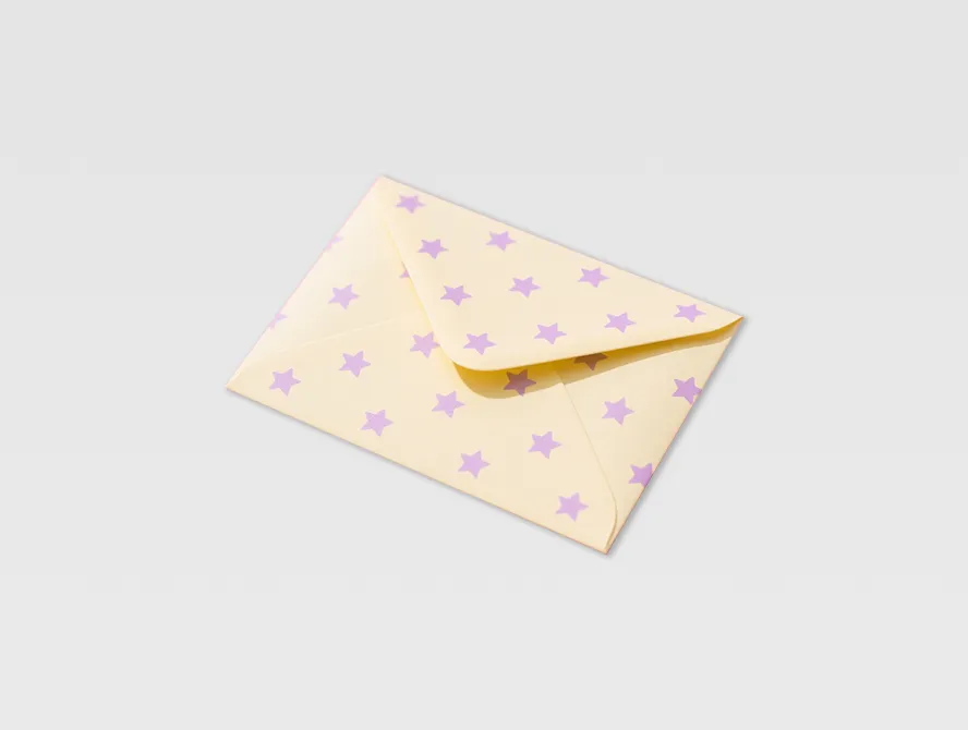 Cream custom envelope with minimalist dotted pattern