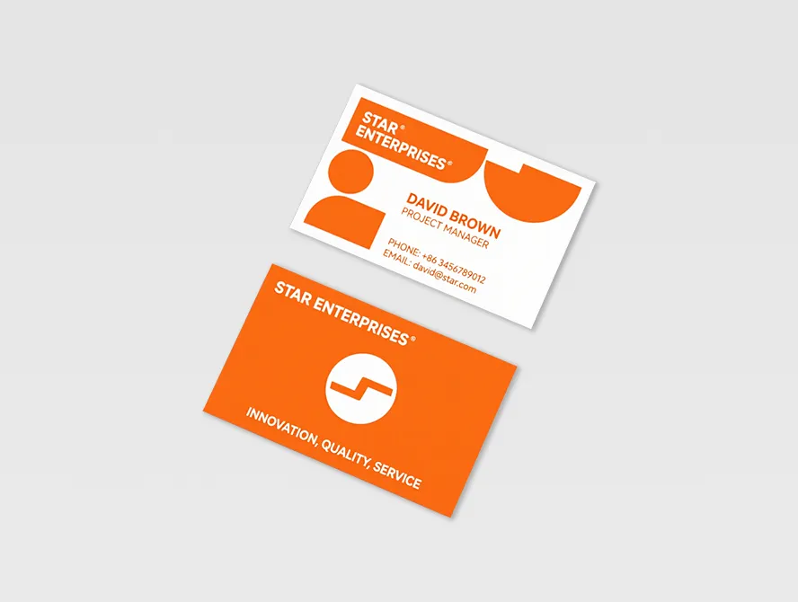 Bright orange business card with rounded logo and contact info