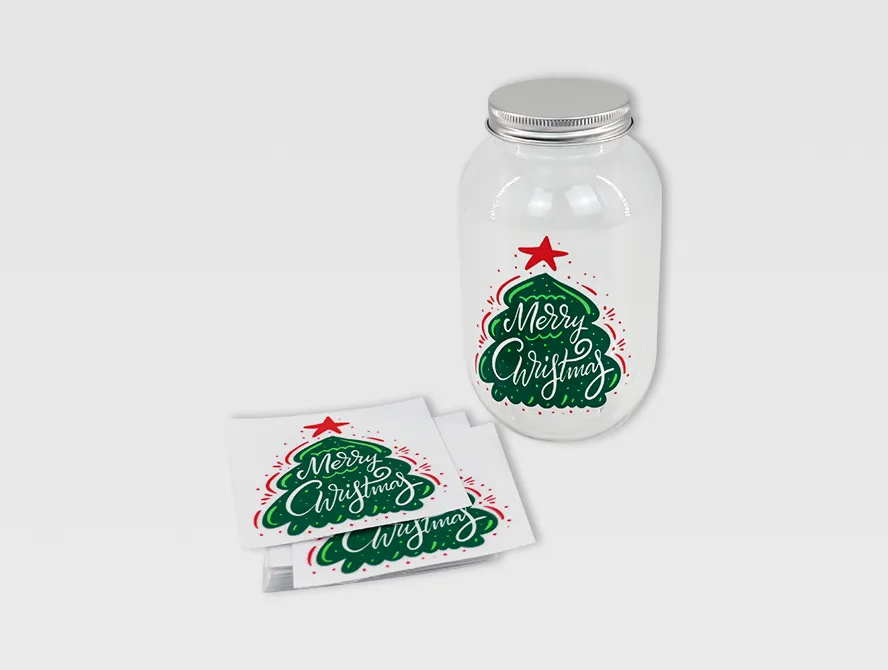 Green uv dtf stickers applied on glass jar with clear film
