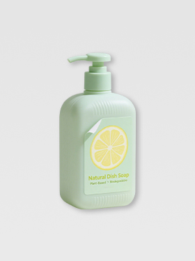 Green body wash bottle labeled with removable product sticker (2)