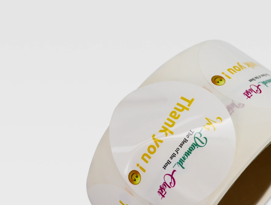 Close up of thank you label roll with colorful handwritten style