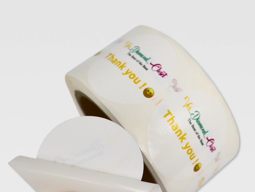 Thank you stickers roll with pastel lettering for gift packaging