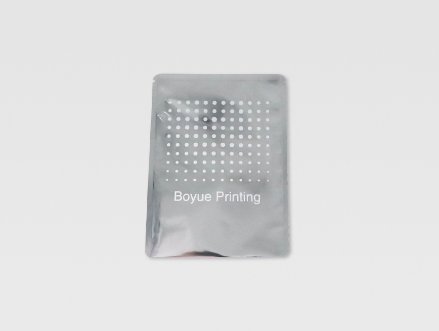 Glossy silver foil packaging pouches with tear notch and sealed edges