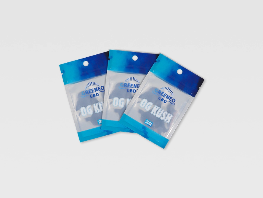 Three blue mylar bags with transparent panels arranged in a fan layout