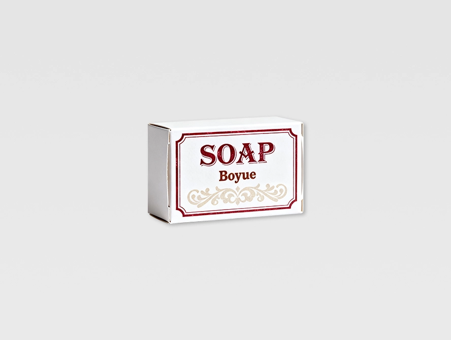 Minimalist white soap packaging with red outlined label