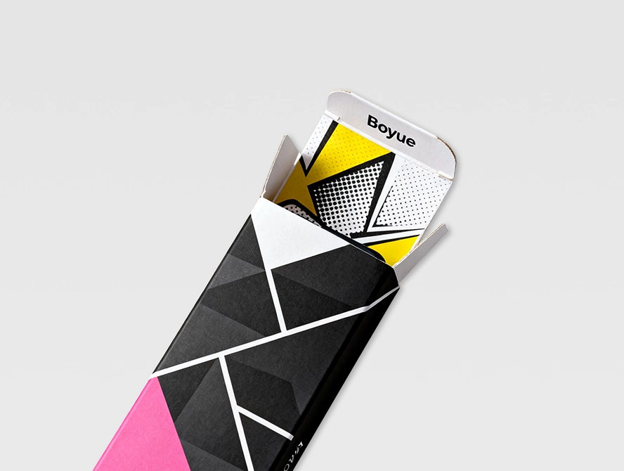 Black double sided printed box with yellow inner print and triangle pattern