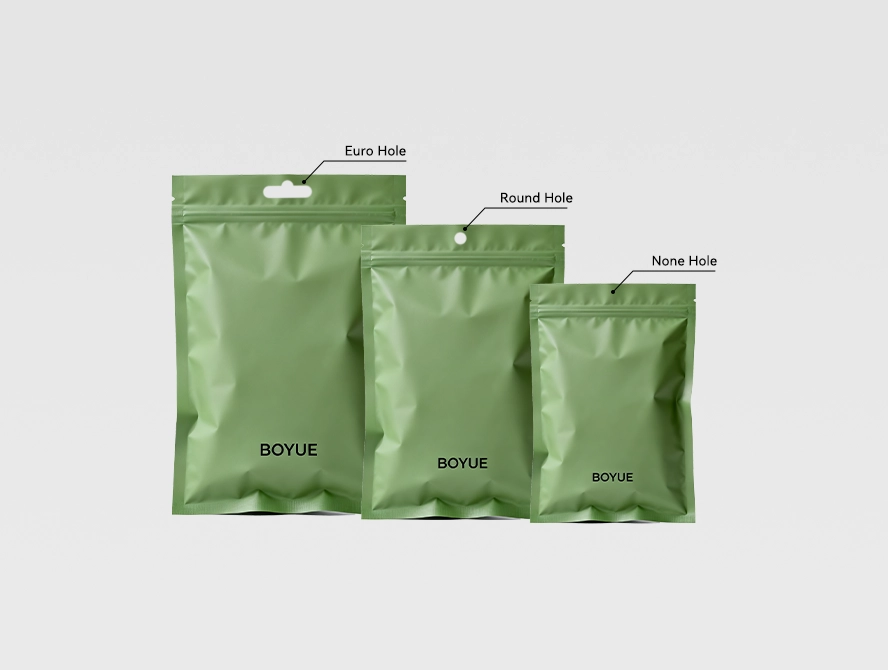 Close up of hanging hole options and top seal finishes on pouches