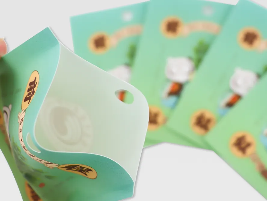 Set of white kraft 3 side seal bags with peel off backing shown partially open