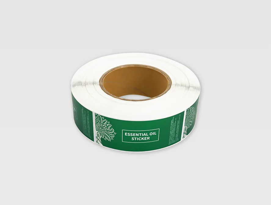 Roll of custom essential oil labels in green design
