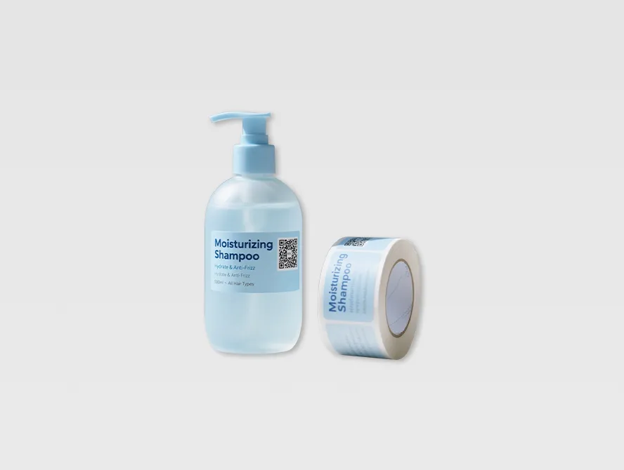 Qr code label stickers applied on light blue shampoo bottles