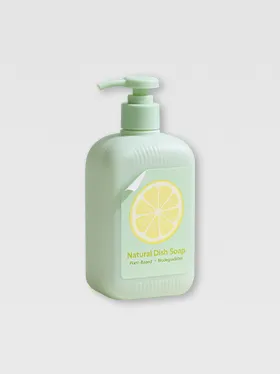 Green body wash bottle labeled with removable product sticker (2)