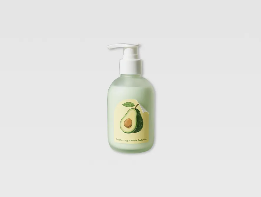Custom removable sticker applied on green shampoo bottle
