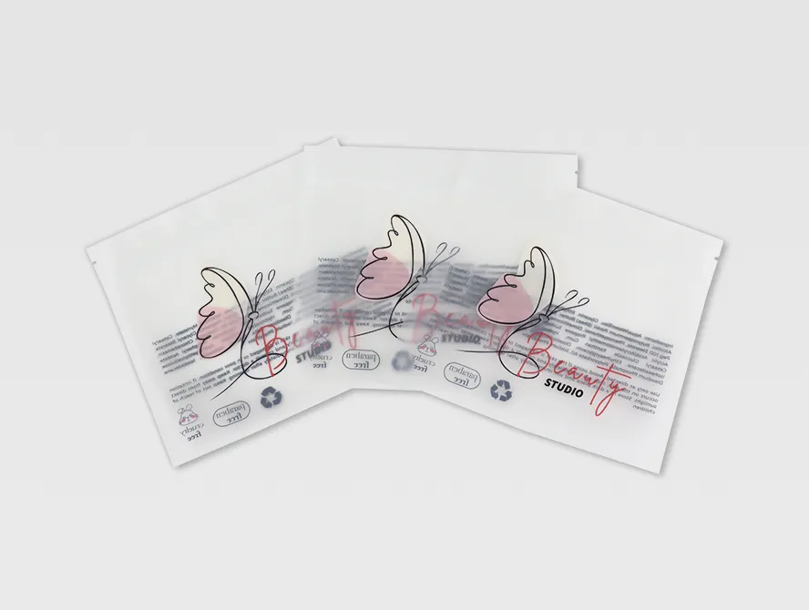 Set of two clear flat pouches with product cards visible through the plastic