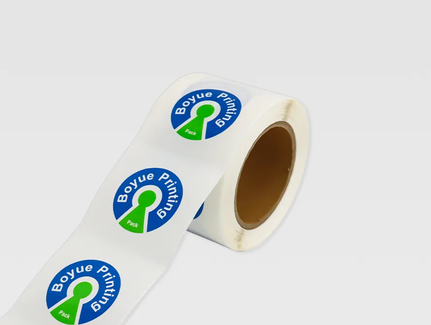 Angled view of custom round logo stickers on roll