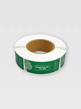 Roll of custom essential oil labels in green design (2)