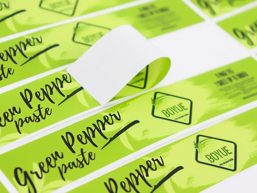 Die cut food labels stacked on sheet