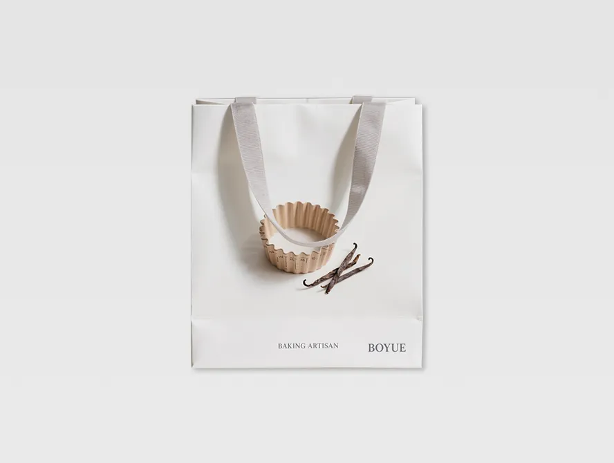 White minimalist gift bag with luxury brand logo design